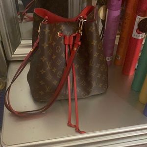 Louis Vuitton Neo-Noe Coquelicot Interior with authentication booklet  receipt